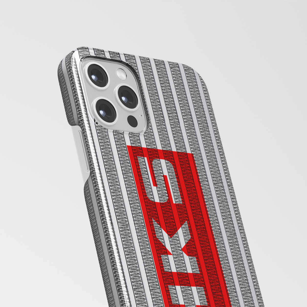 Some details of a silver and red HKS Aluminum phone case